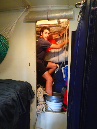 Cramming spare gear into the sail locker