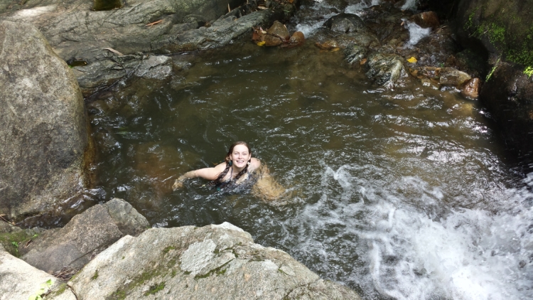 Graceie swimming in the small pond at the bottom of the waterfall 